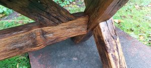 Detail of commemorative bench showing Welsh oak legs and beams.